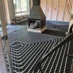 Suelo radiante en salón-comedor de vivienda familiar.